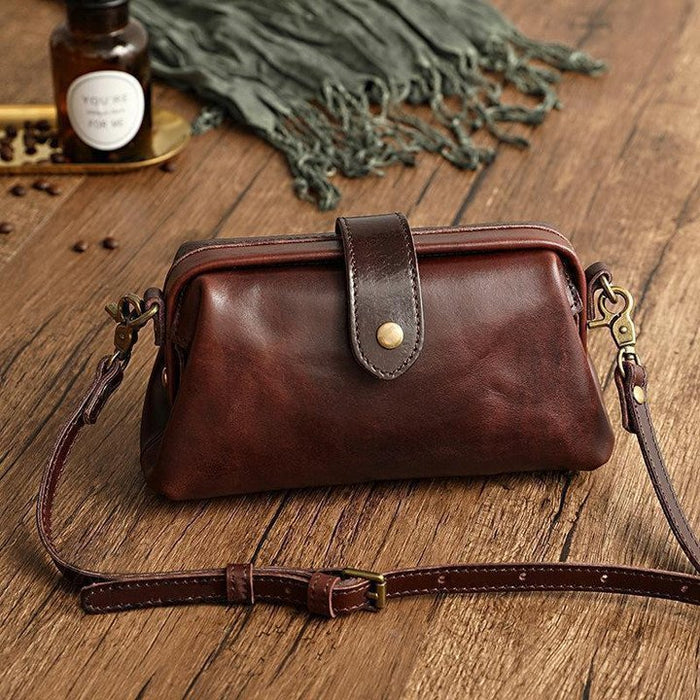 Women's Leather Crossbody Bag with Clasp and Strap