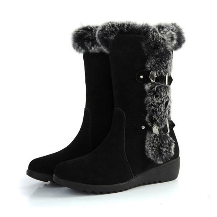 Women's mid-calf snow boots with faux fur trim and buckles