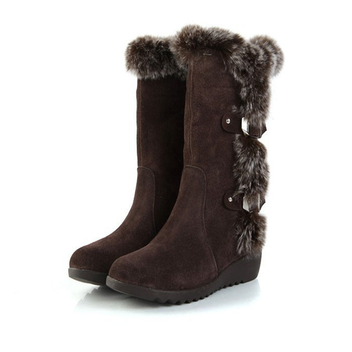 Women's mid-calf snow boots with faux fur trim and buckles