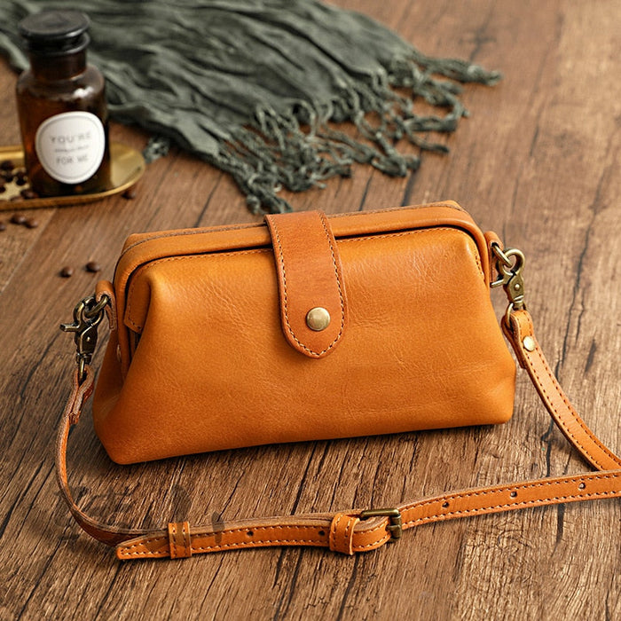 Women's Leather Crossbody Bag with Clasp and Strap