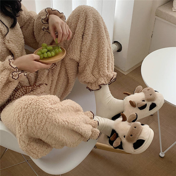 Fluffy cow face slippers